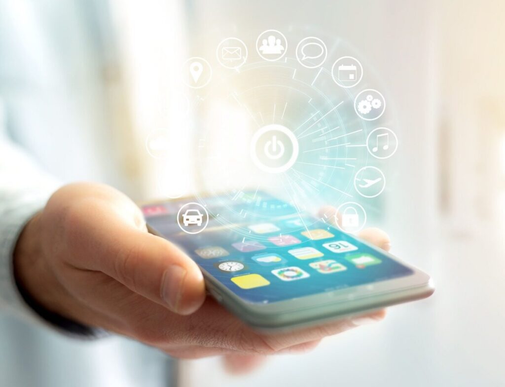 スマホを持つ男性の手と機能アイコンのイラスト